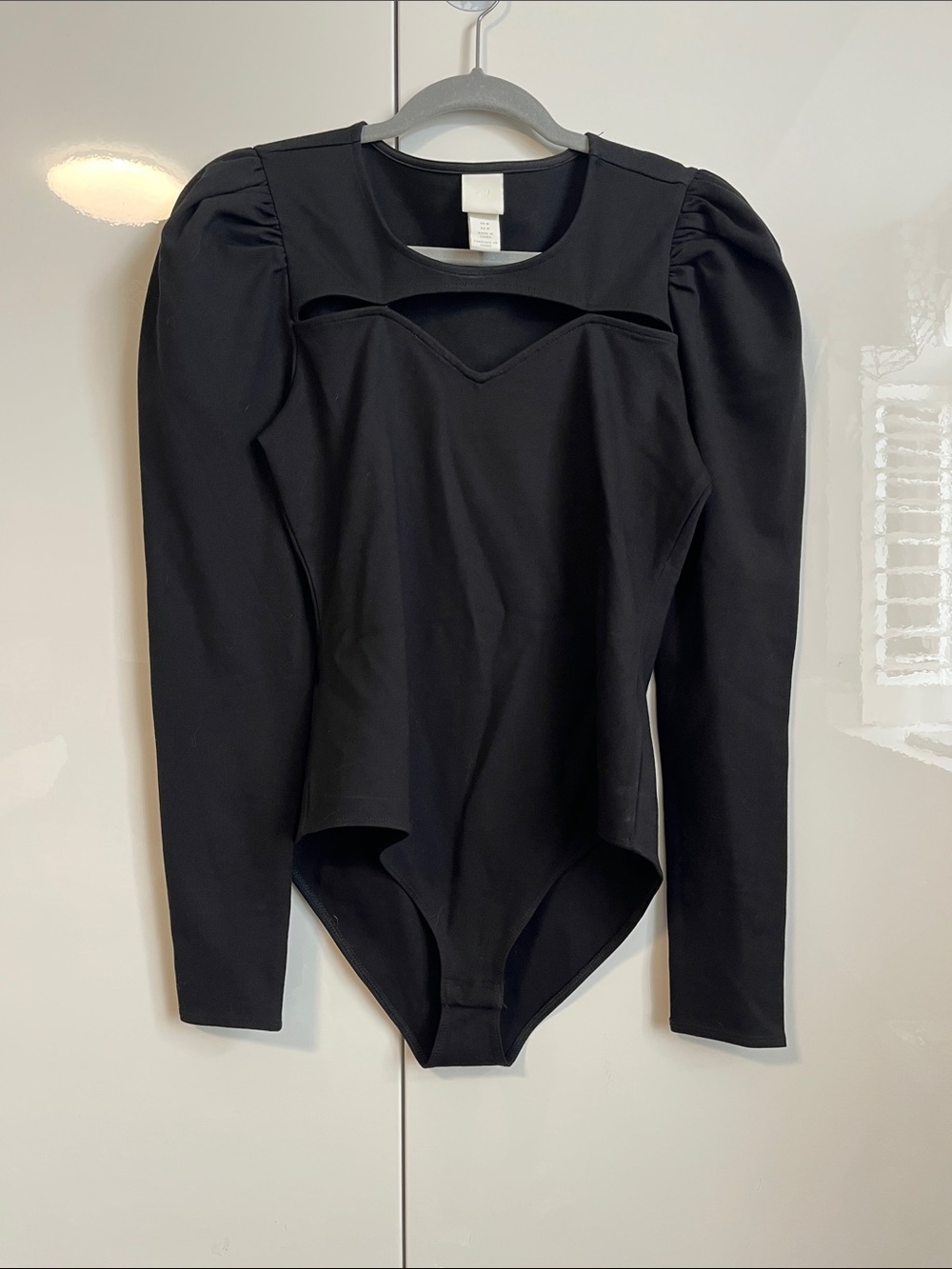 NWOT H&M Black Puff Sleeve Cutout One-Piece Bodysuit, Size M